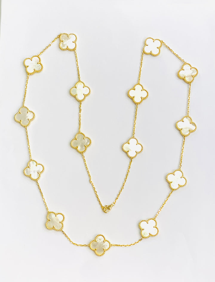 Long gold plated mother of pearl clover necklace
